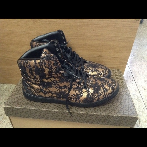 black and gold lacoste shoes